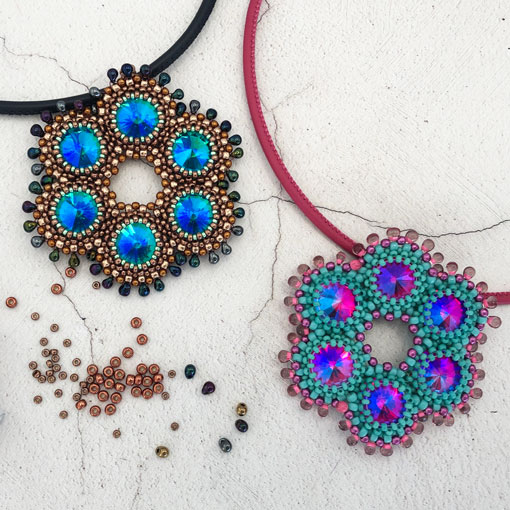Tudor rose virtual beading class - a dramatic beaded pendant using seed beads and rivolis. The pendant is made up of 6 bezelled rivolis joined in a ring